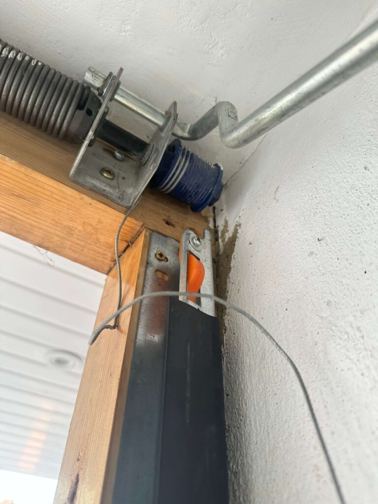 Twisted garage door cable repair in Essex
