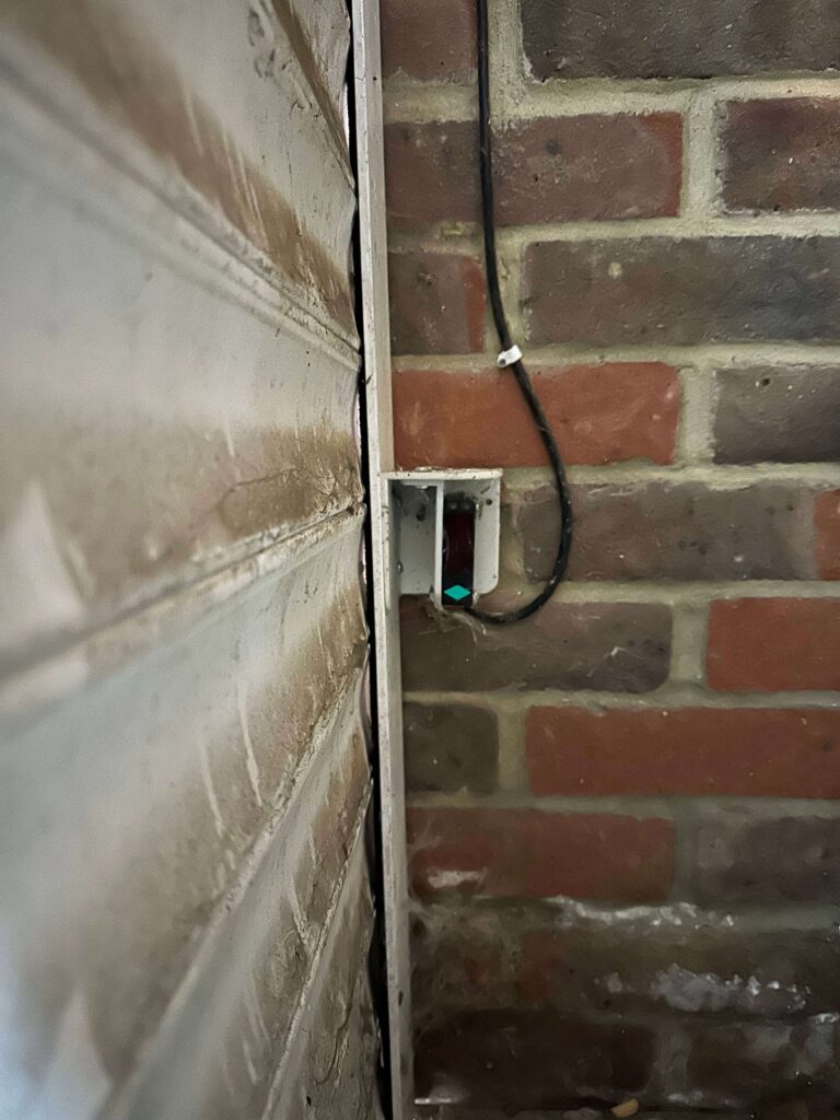 garage door photocell repair in Essex