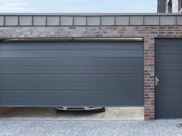 Sectional-garage-door-with-side-hinged-personnel-door